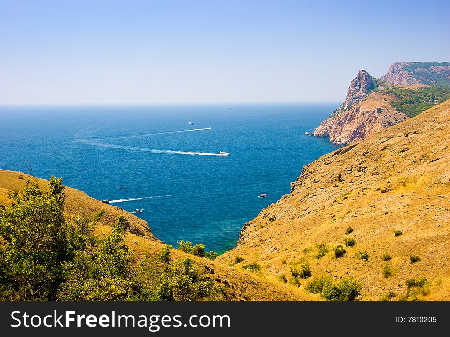 Sea coastline with a lot of boats in the water