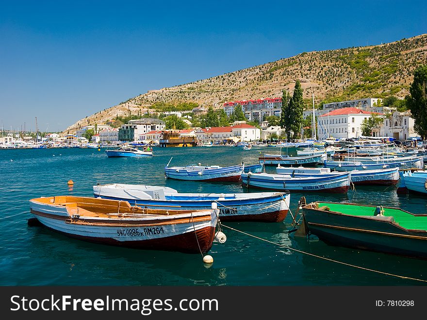 Yachts in a sea bay. Yachts in a sea bay