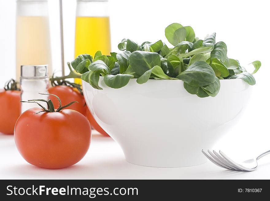 Fresh natural salad bowl tomato lettuce onion oil vinegar