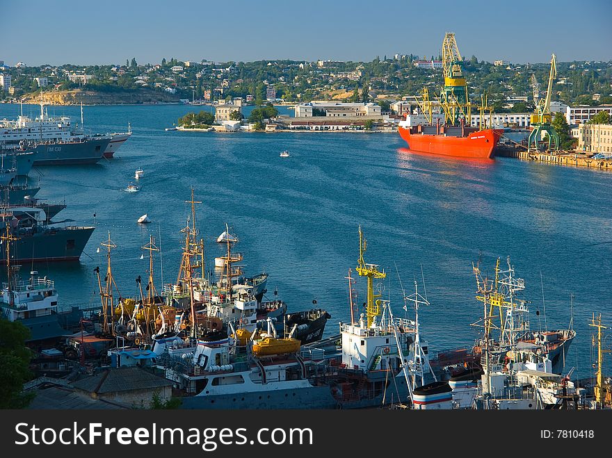 Different ships and cranes in a port