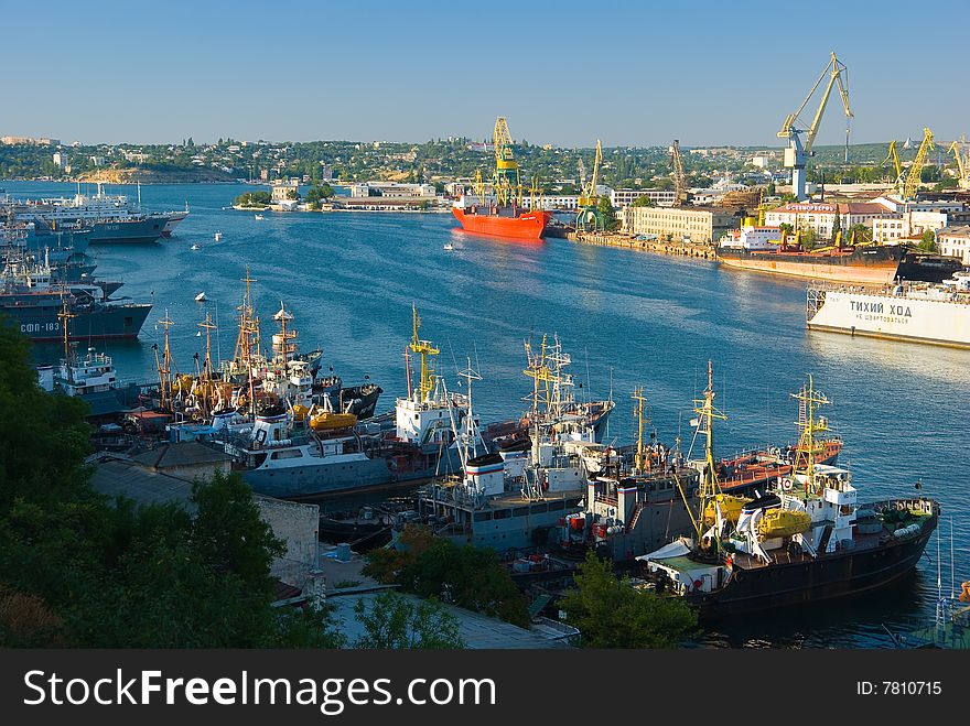 Different ships and cranes in a port