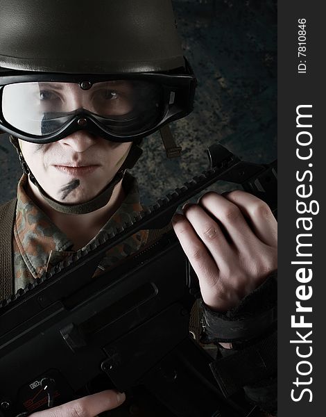 Shot of a soldier holding gun. Shot of a soldier holding gun.