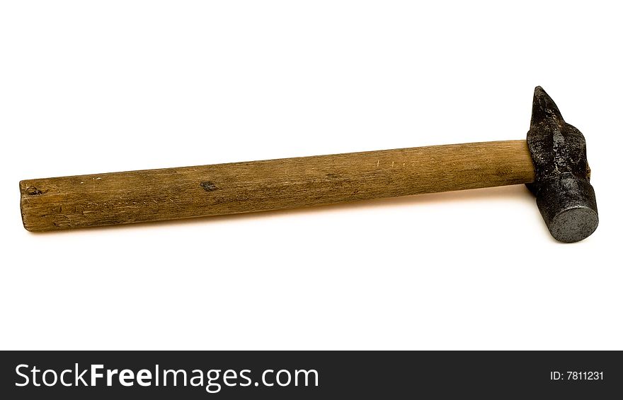 Simple hammer with the wooden handle. It is isolated on a white background with clipping path. Studio light. Simple hammer with the wooden handle. It is isolated on a white background with clipping path. Studio light.