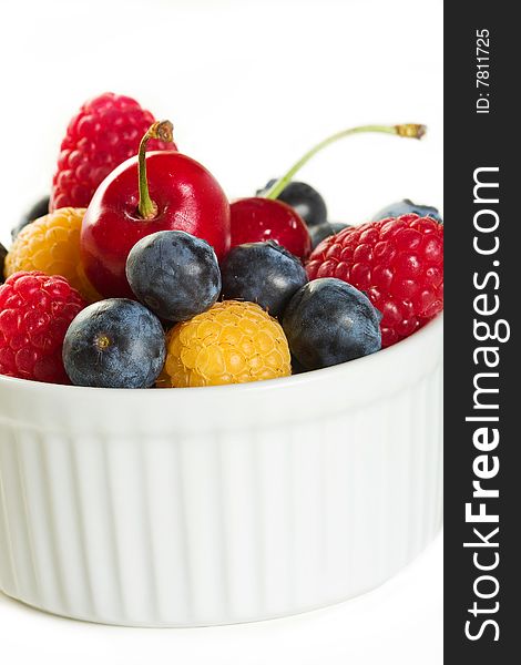 Various Fresh and Delicious berries in a white Ramekin. Various Fresh and Delicious berries in a white Ramekin