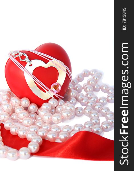 Valentine hearts,red ribbon,pink pearls on white background.