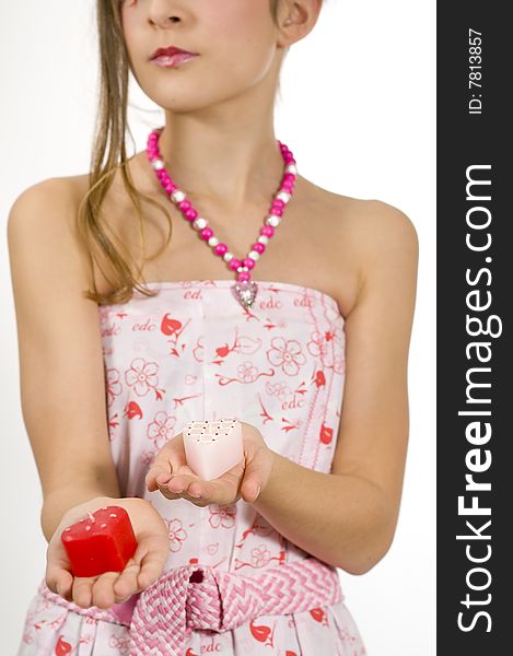 Girl with valentine candles in hands