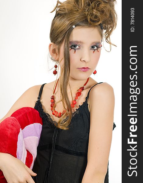 Girl holding a valentine's day pillow