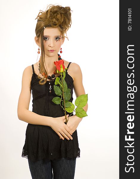 Fashion girl with black red necklace and black top holding a valentine's day red rose in her hand. Fashion girl with black red necklace and black top holding a valentine's day red rose in her hand