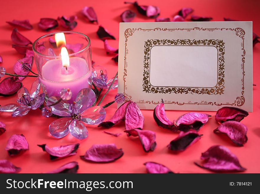 Candle with crystal flower, dry petals and Blank Card. Candle with crystal flower, dry petals and Blank Card