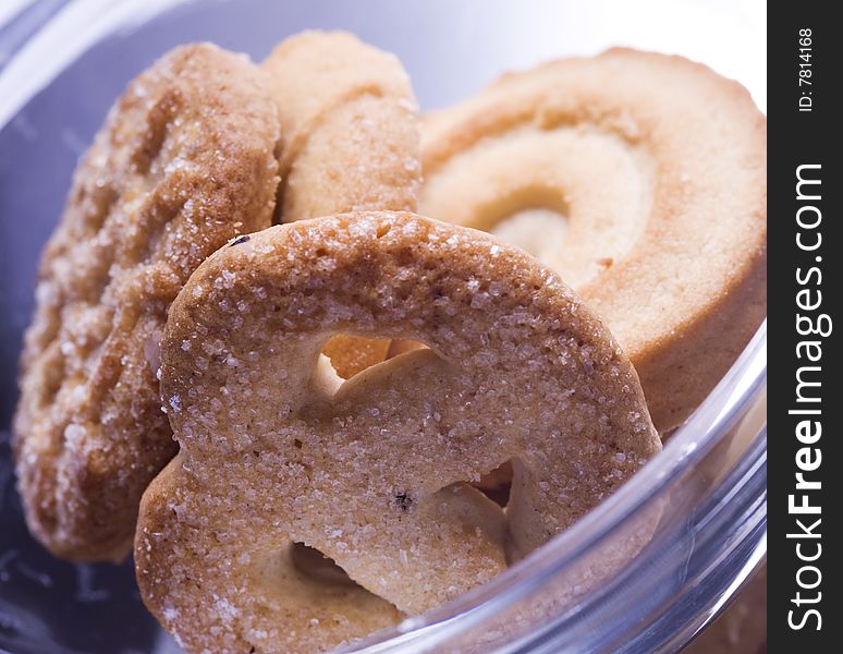 Danish traditional homemade cookies in a glass bowl, close up. Danish traditional homemade cookies in a glass bowl, close up