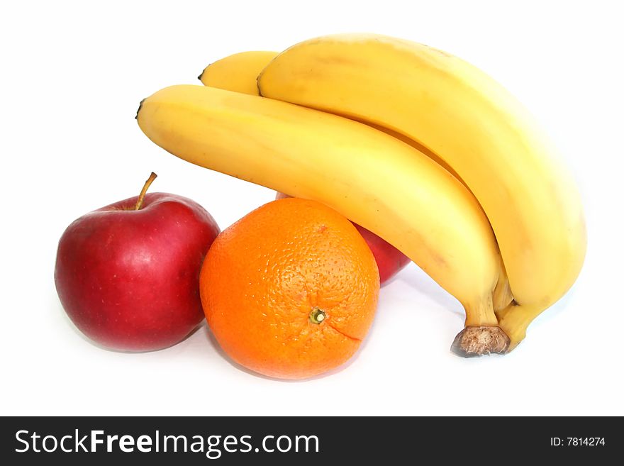 Banana apple and orange isolated against white. Banana apple and orange isolated against white.