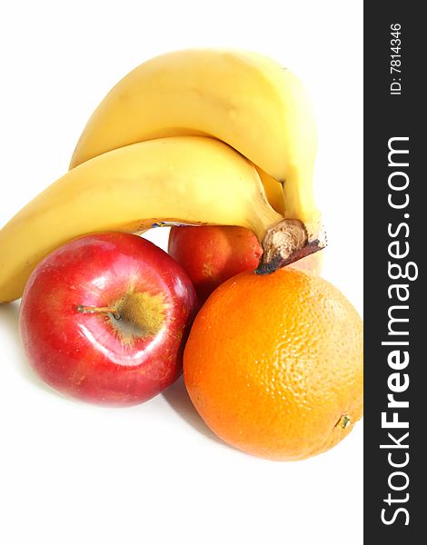 Banana apple and orange isolated against white. Banana apple and orange isolated against white.