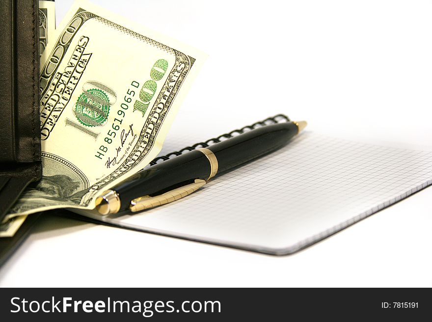 Notepad with pen and purse with money