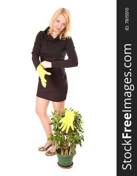 Young woman looking after plant
