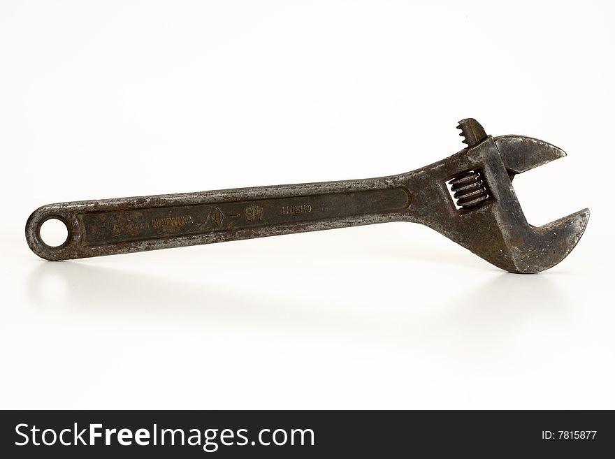 Old spanner on a white background. Old spanner on a white background.