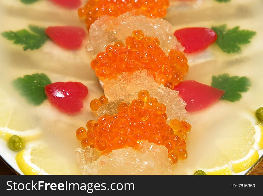 Fish jellied with red caviar. Fish jellied with red caviar.