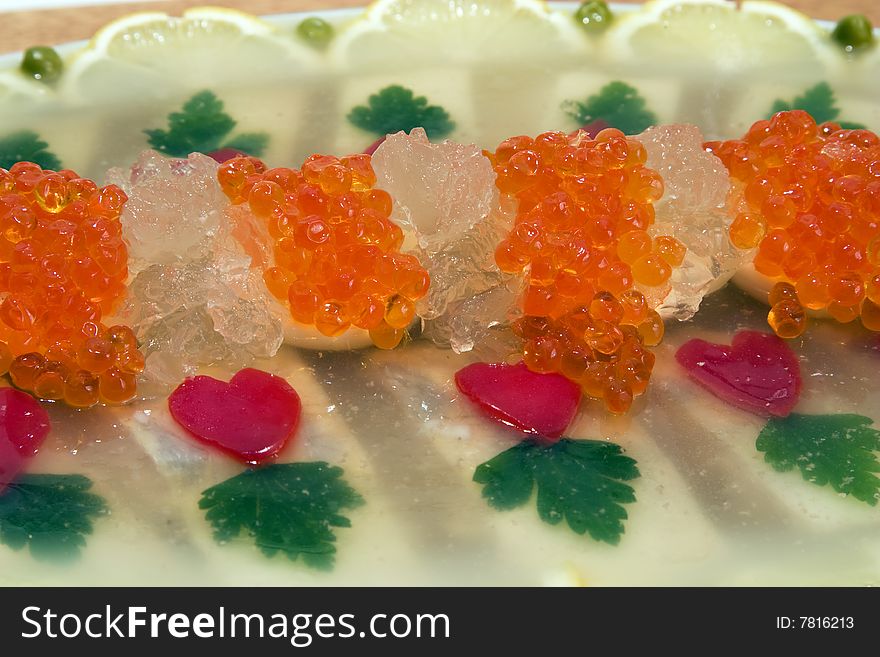 Fish jellied with red caviar. Fish jellied with red caviar.