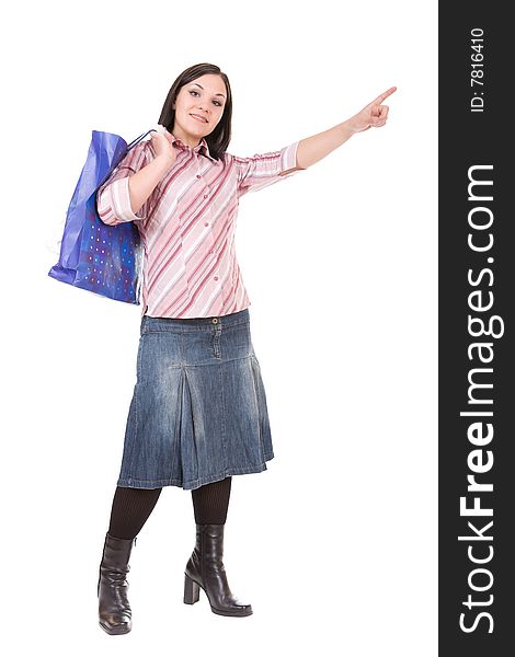 Attractive shopping woman isolated over white