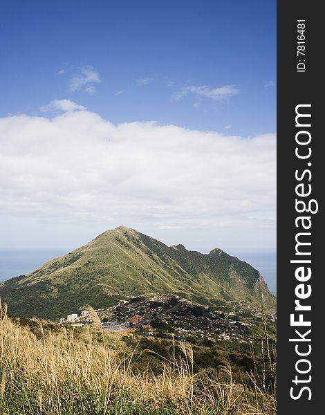 Keelung Mountain and village, on the north east coast of Taiwan.  This area used to be a mining, where gold and coal was mined. The area has spectacular scenery.