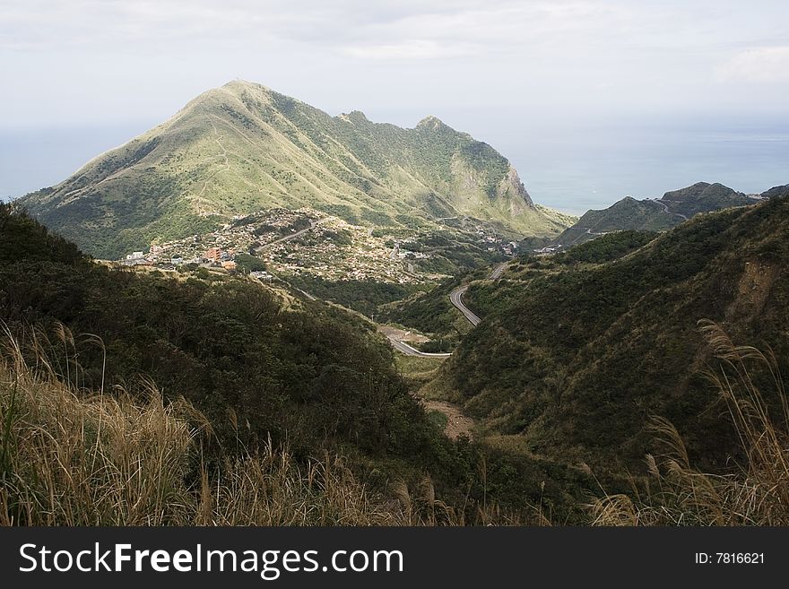 Keelung Mountain and village, on the north east coast of Taiwan.  This area used to be a mining, where gold and coal was mined. The area has spectacular scenery.