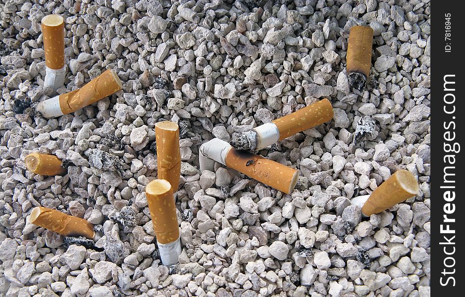 Close up of ashtray and cigarettes butts