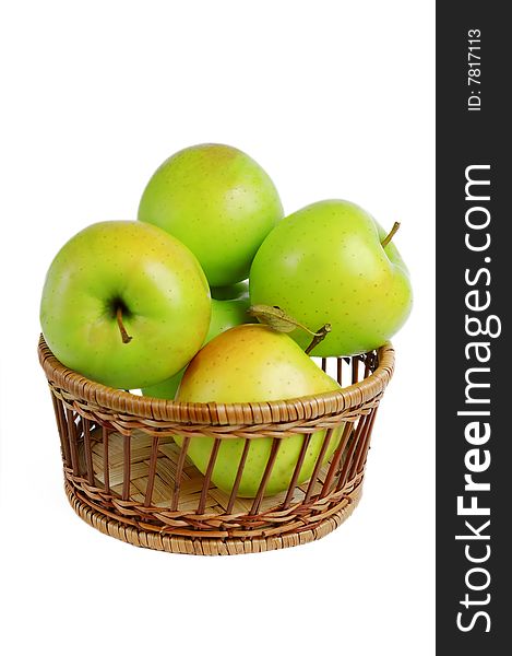 Isolated fruit wicker basket with apples