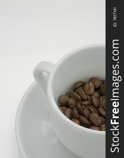 Crop image of coffee bean in ceramic cup. Crop image of coffee bean in ceramic cup