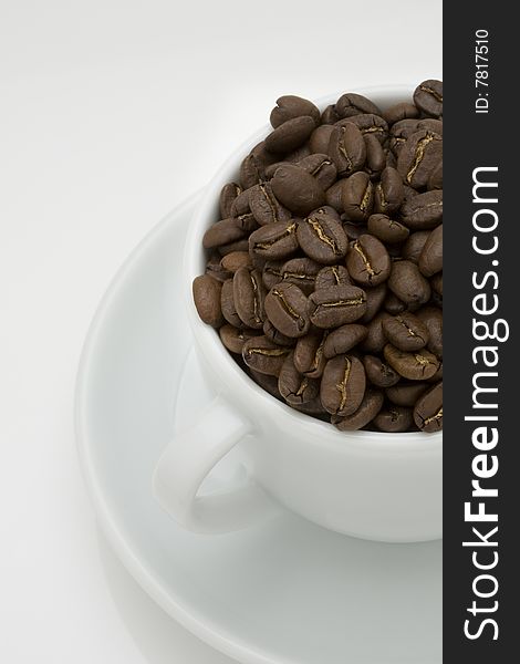 Crop image of coffee bean in ceramic cup. Crop image of coffee bean in ceramic cup