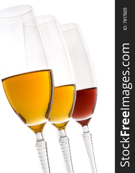 Glasses of red and white wine on white background