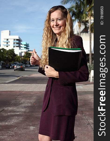 Real estate agent standing on the street. Real estate agent standing on the street