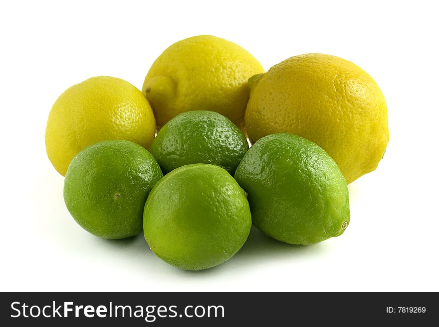 Yellow and green lemon on white background