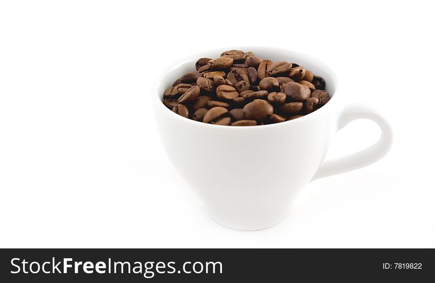 The fried grains in a white mug. The fried grains in a white mug