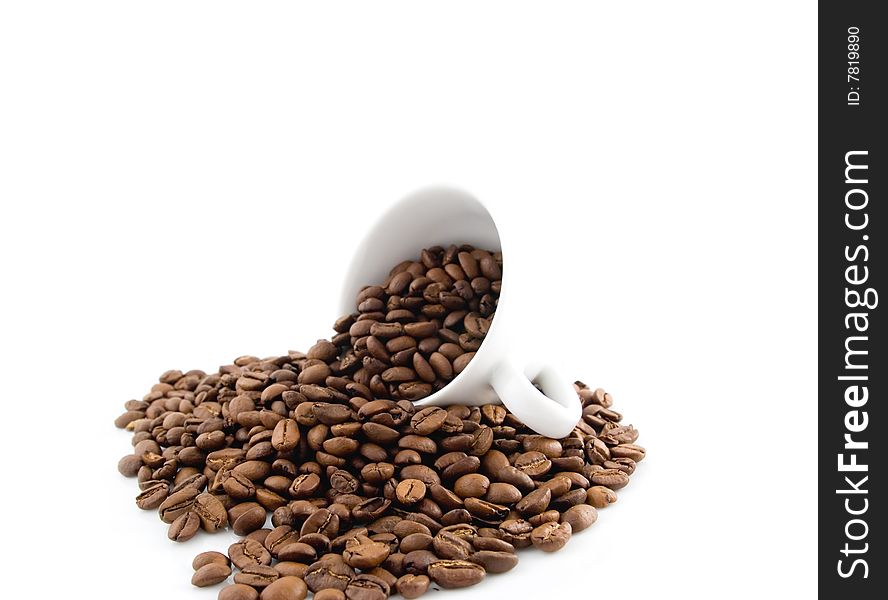 Scattered coffee and white mug on the white  background