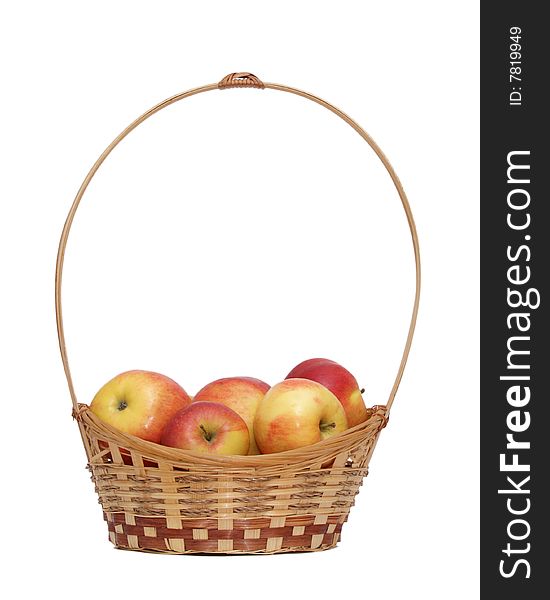 Basket wth apples isolated on a white background .