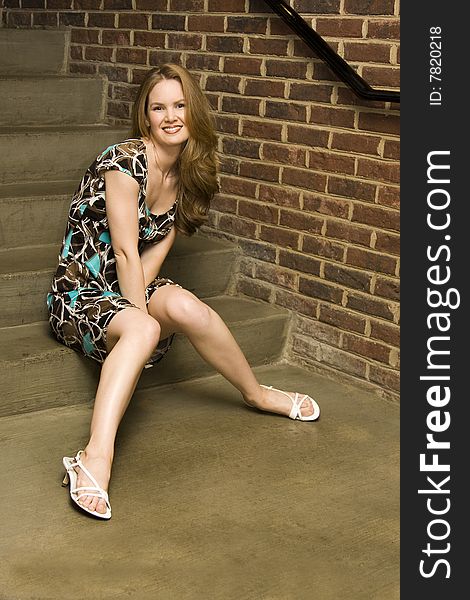 Young Woman Sitting Down on Steps. Young Woman Sitting Down on Steps