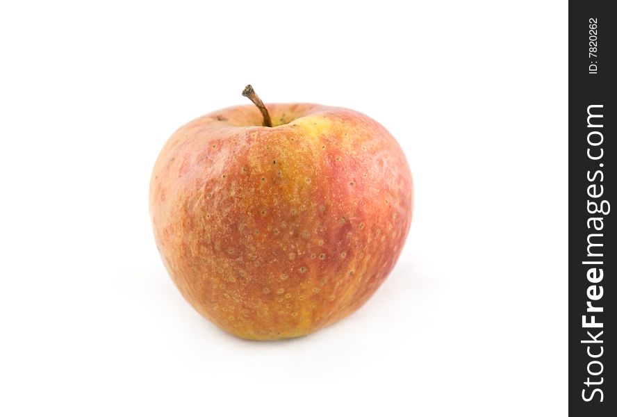 The ripe apple is dehydrated, wrinkled and dry. The ripe apple is dehydrated, wrinkled and dry