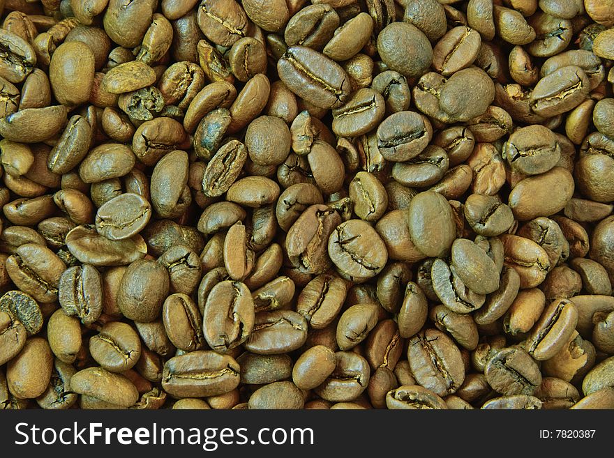 Background out of lightly roasted coffee beans