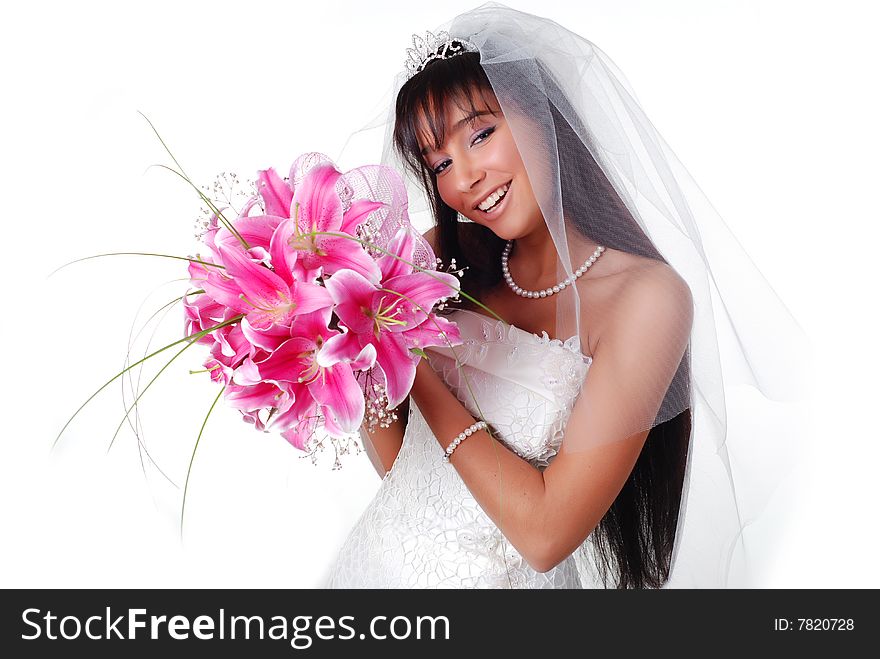 Young bride with bouquet of lilys on a white background