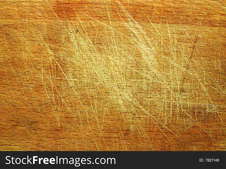 Old natural scratched brown wooden textured background