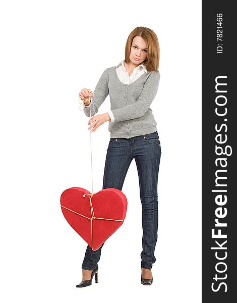 Pretty girl holding bounded heart  over white