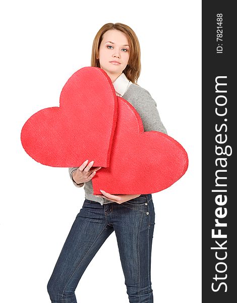 Model girl holding two hearts  over white