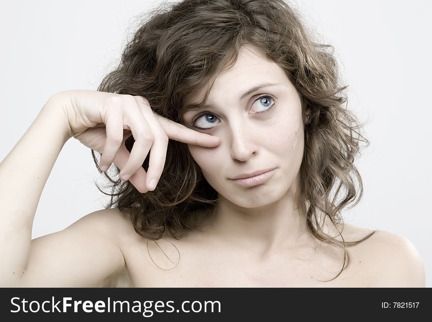 Angry girl on white background