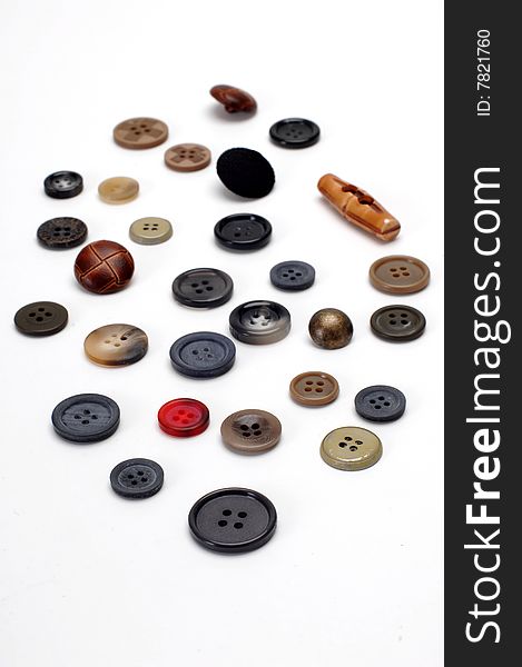 A few buttons isolated at white