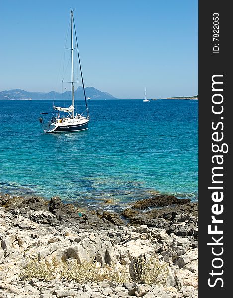 Mediterranean view, small sailboat in Croatia