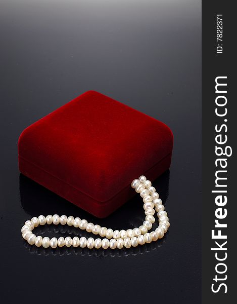 Jewellery box with pearl at black. Jewellery box with pearl at black