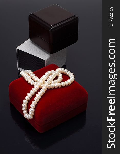Jewellery boxes with pearl at black. Jewellery boxes with pearl at black
