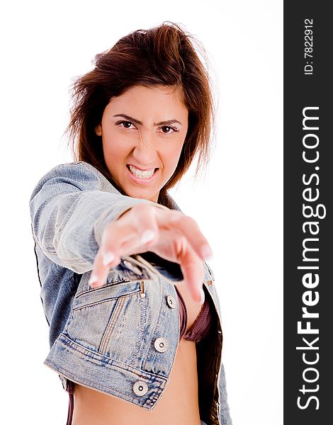 Portrait of young female showing hand gesture on an isolated background