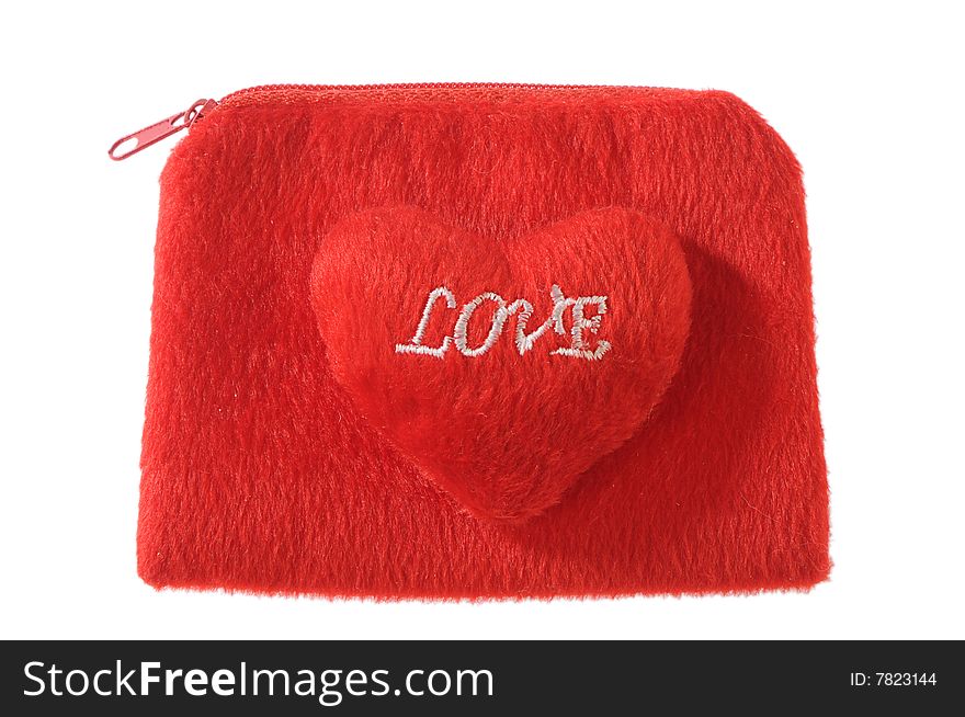 Plush red purse with the figure of heart on one side. Plush red purse with the figure of heart on one side