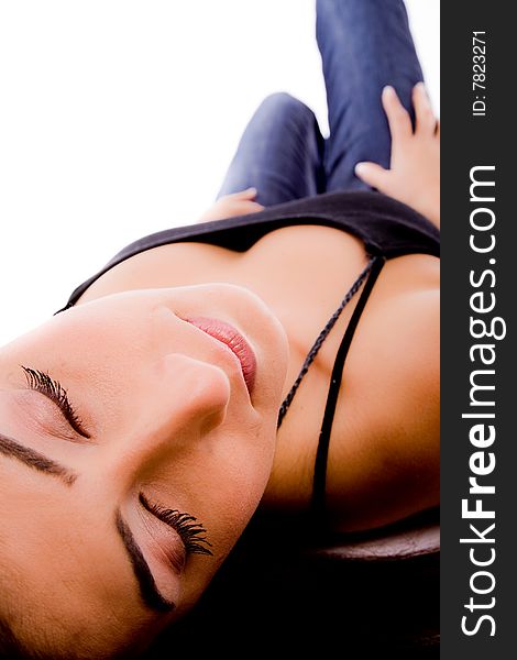 Top view of resting young woman on an isolated white background