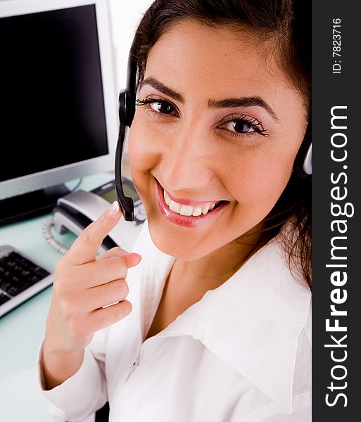 Side pose of smiling telecaller on an isolated white background. Side pose of smiling telecaller on an isolated white background